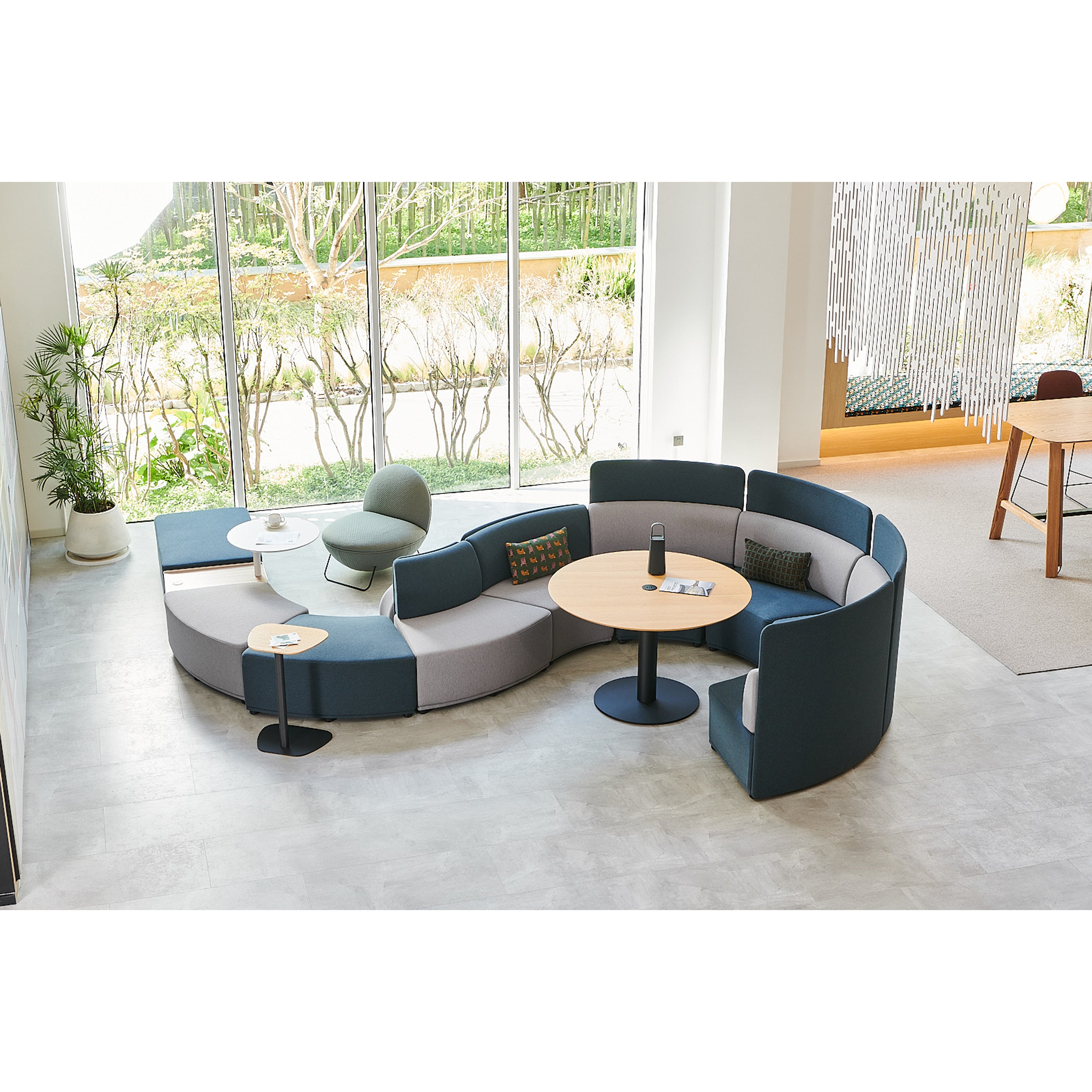 U-Box Modular Sofa arranged in a contemporary lounge, offering customizable seating with acoustic privacy and comfort.